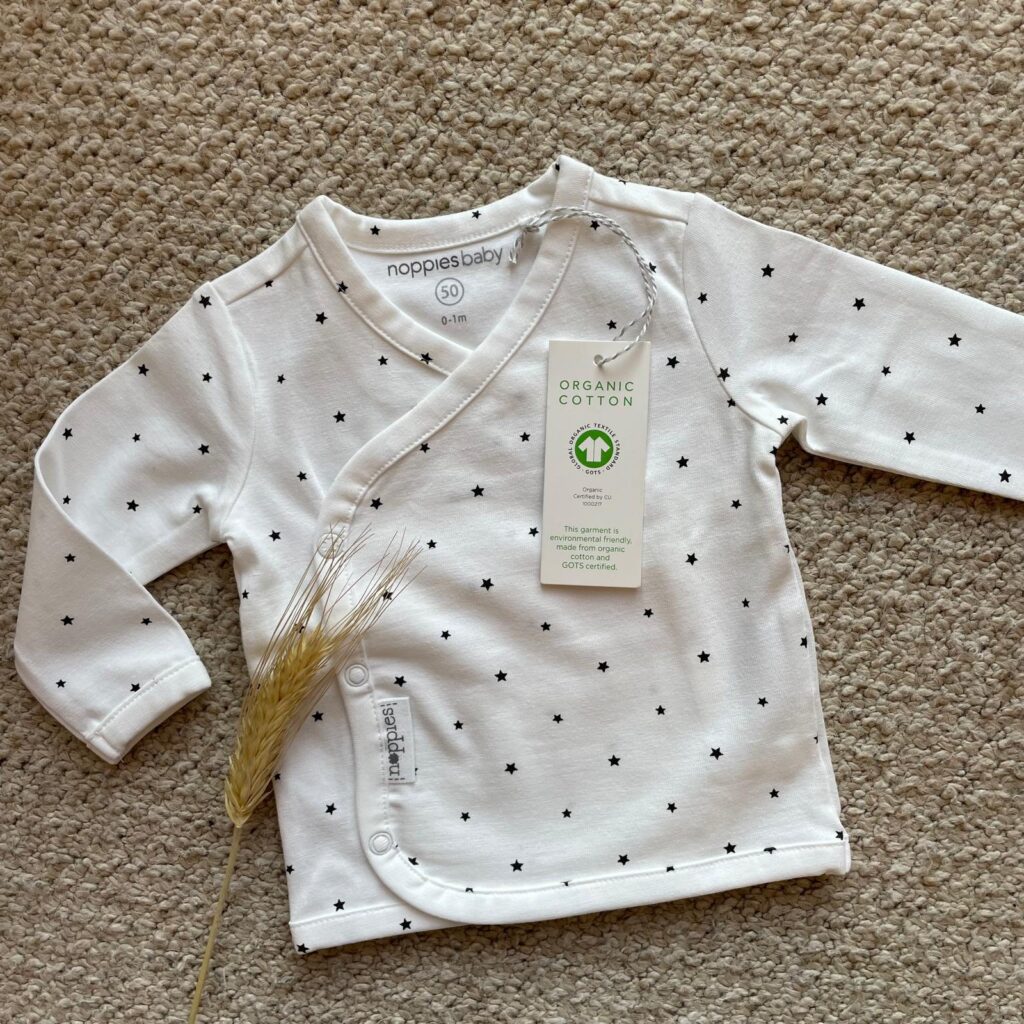 Overslagshirtje noppies wit met sterretjes
